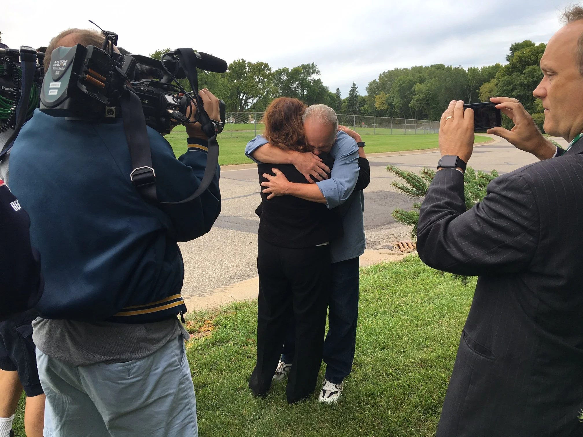 Julie embraces Terry Olson, a freed GN-IP client, after his release from prison.